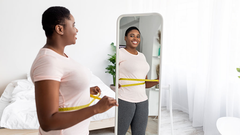 woman looking in the mirror